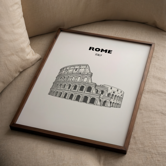 Framed print of the Colosseum with 'Rome, Italy' text on a beige couch.