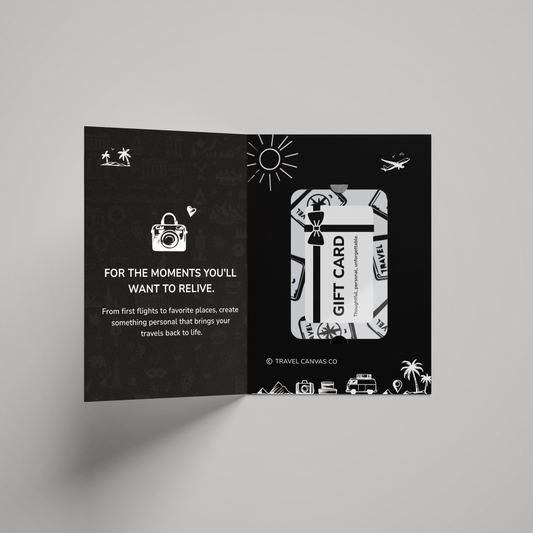 Open black card with white text and graphics on a gray background