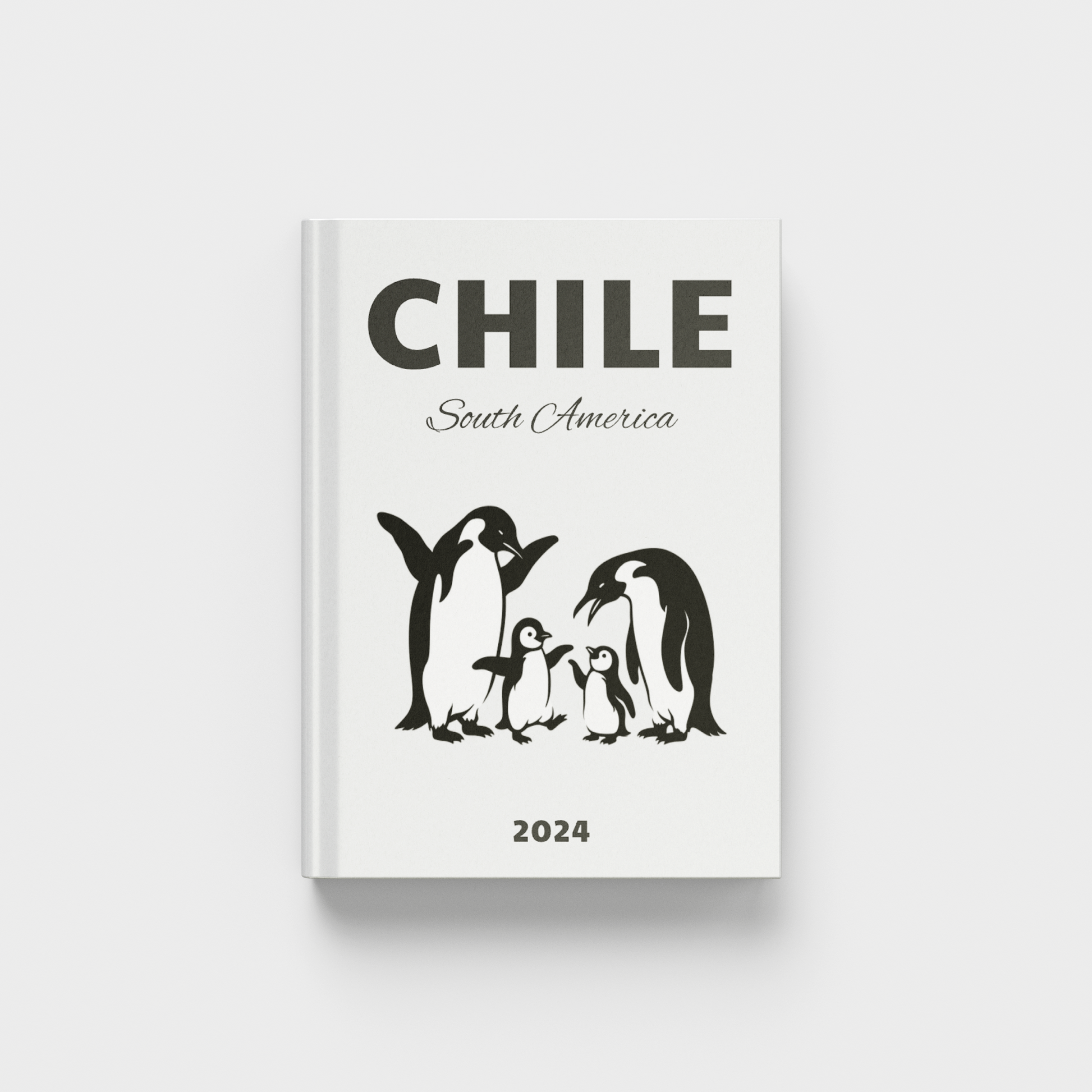photobook with penguin illustration and 'Chile South America' text on a white background