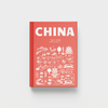 Red photobook titled 'China' with white illustrations on a light gray background