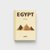 Beige photobook with 'Egypt Cairo 2024' text and pyramid design on a white background