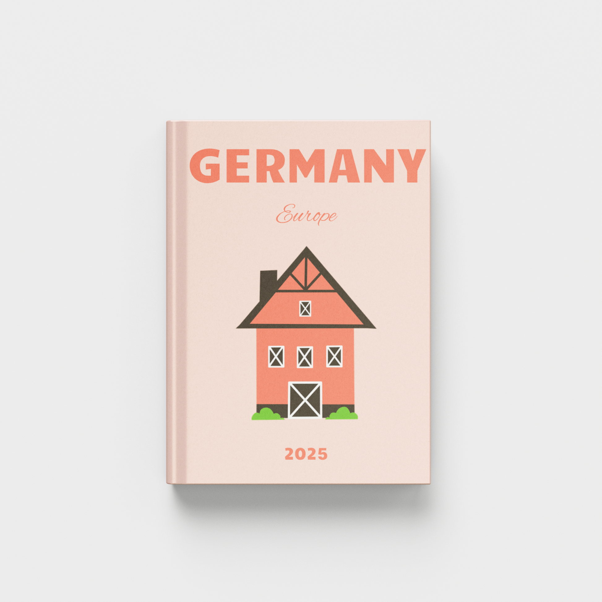 photobook for Germany with a house illustration on a light pink background