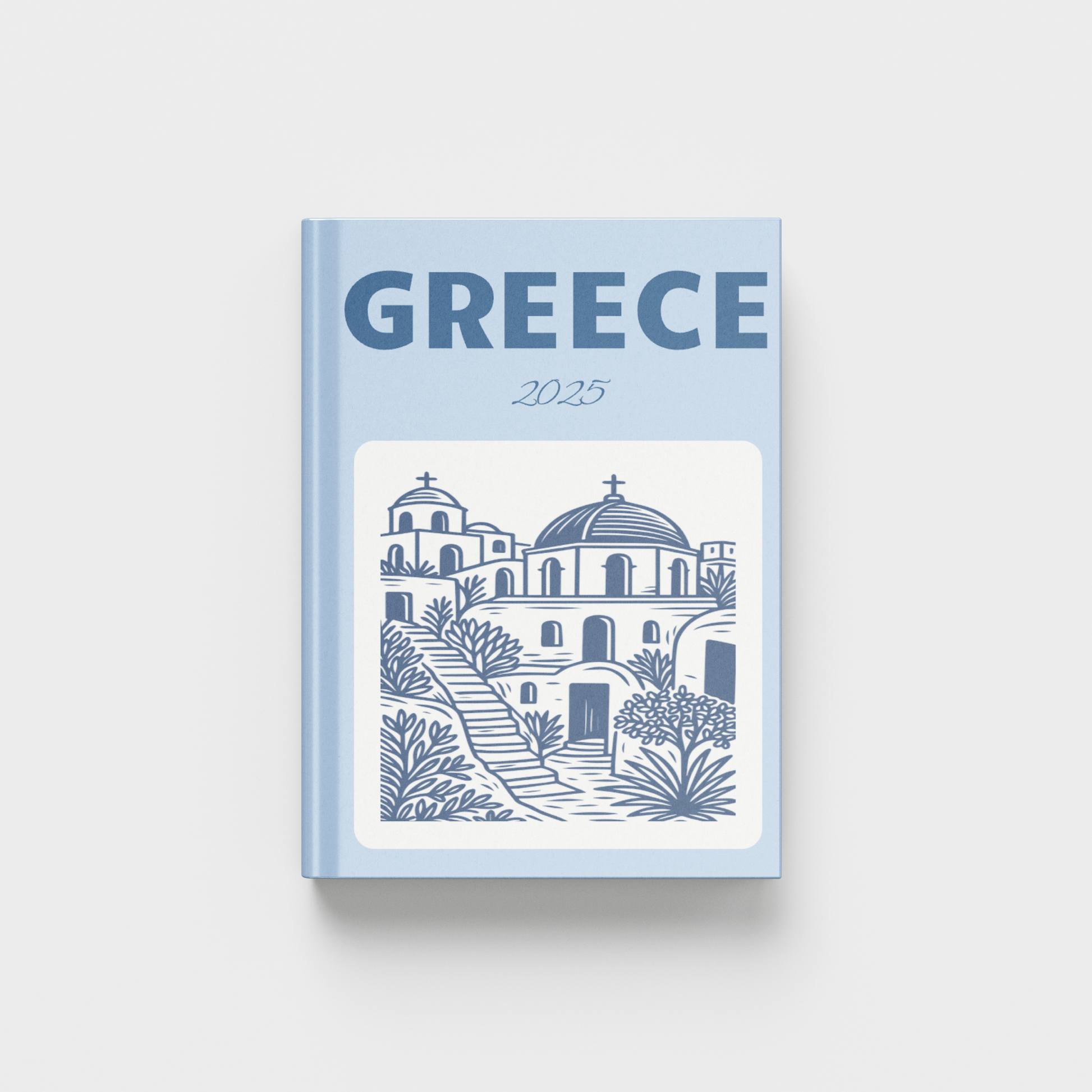 photobook with 'Greece' and '2025' text on a light blue background