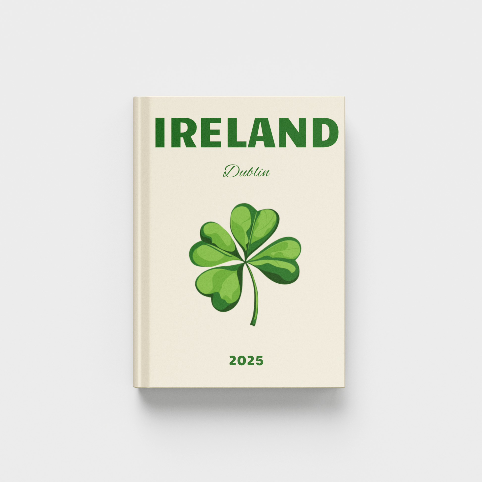 photobook with 'IRELAND Dublin' text and a shamrock on a cream background