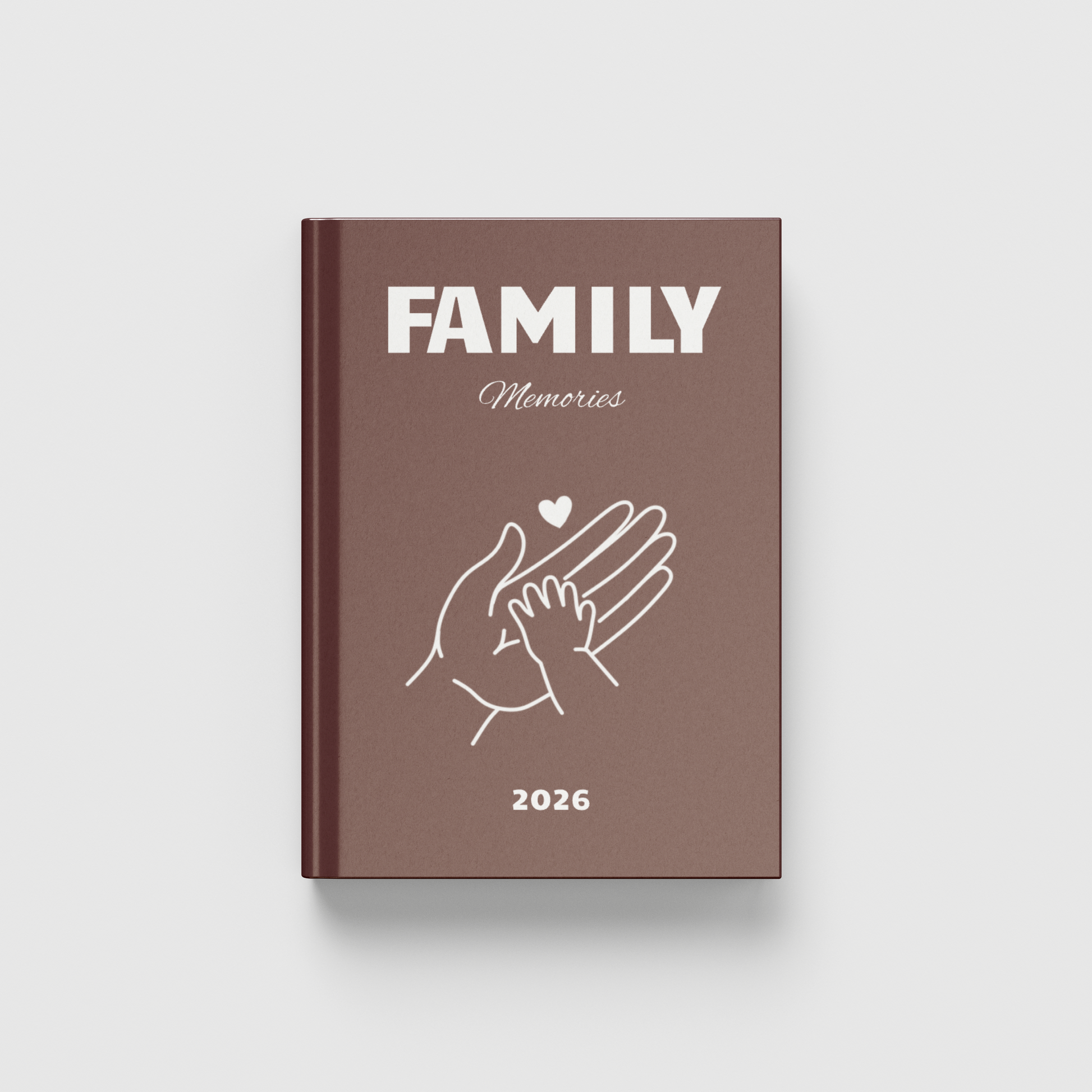 Brown photobook titled 'FAMILY' Memories 2026' with a design of two hands holding a heart on a white background.