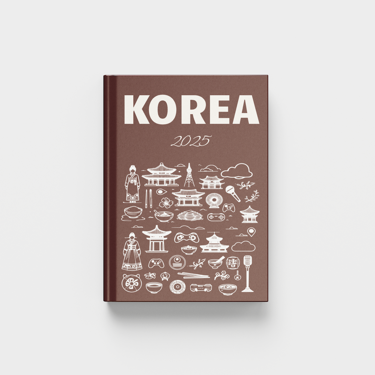 photobook cover with 'Korea 2025' text and white illustrations on a brown background