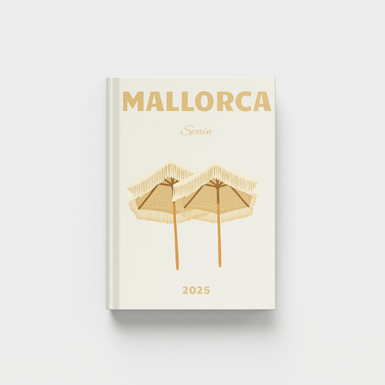 Cream photobook with 'Mallorca' and 'Spain' text on a white background