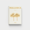 Cream photobook with 'Mallorca' and 'Spain' text on a white background