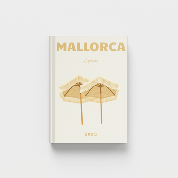 Cream photobook with 'Mallorca' and 'Spain' text on a white background