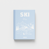 Blue photobook titled 'SKI Trip' on a white background