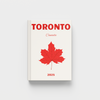 photobook with 'Toronto, Canada' text and a red maple leaf on a white background
