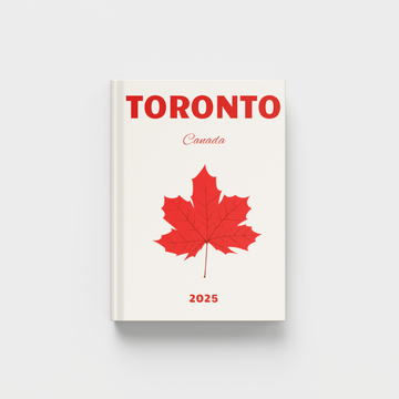 photobook with 'Toronto, Canada' text and a red maple leaf on a white background