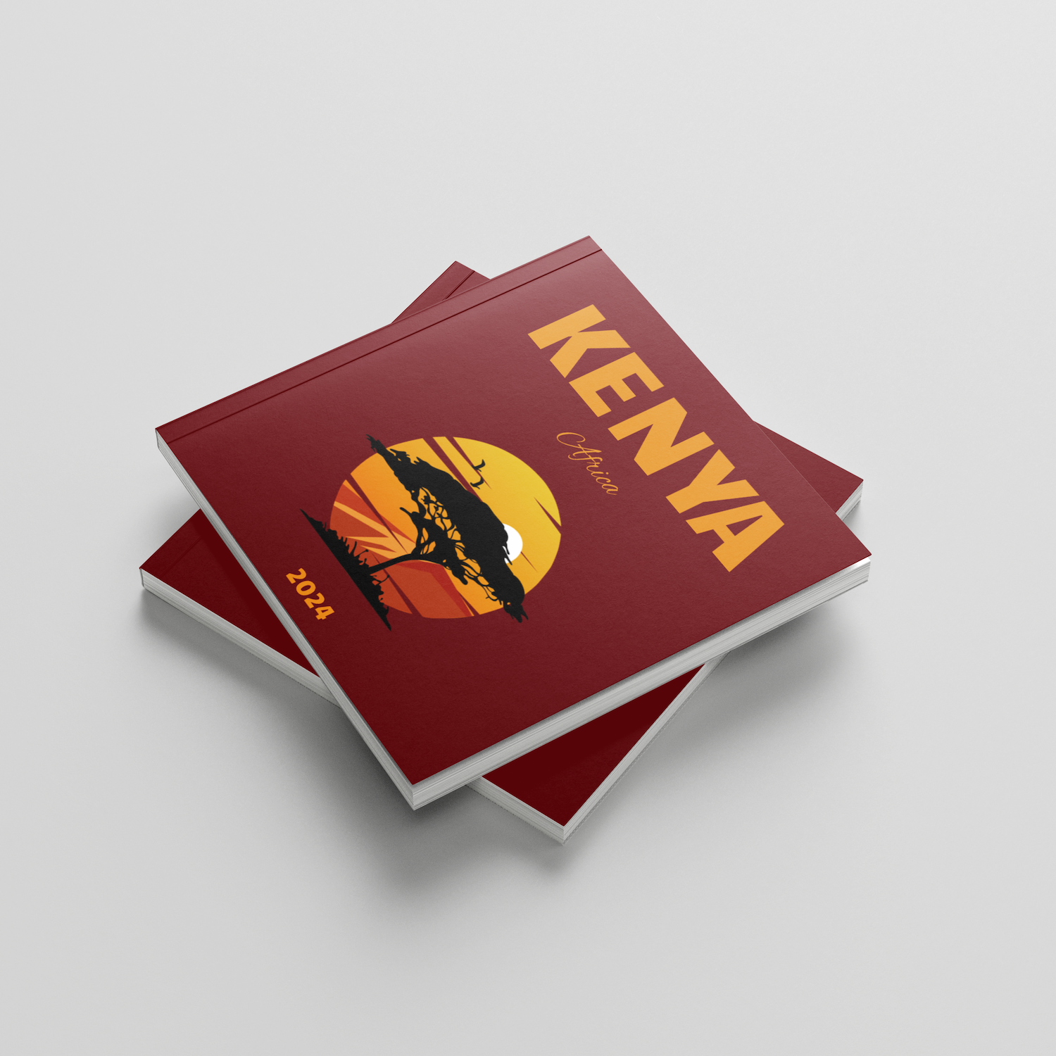 Stack of red square photobooks with 'Kenya' and a safari illustration on a light gray background