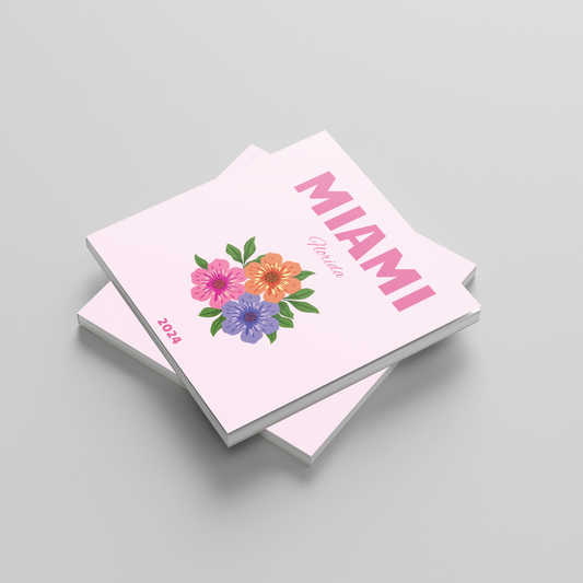 square photobook with floral design and 'MIAMI' text on a gray background