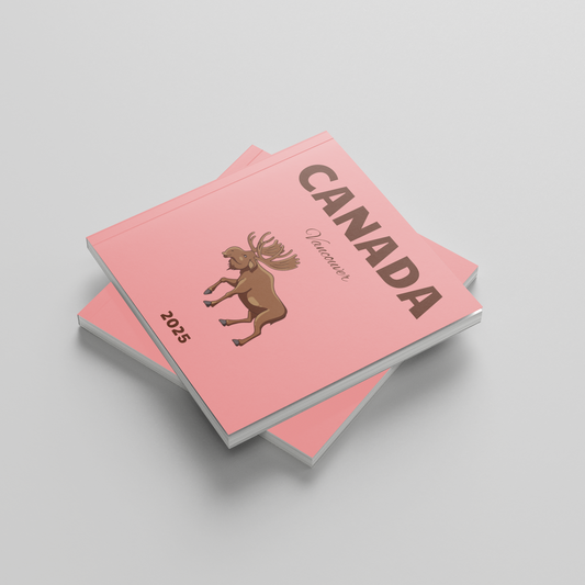 Two red photobooks with 'Canada' and a deer emblem on a light gray background