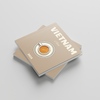 Two square photobooks titled 'Vietnam' with a coffee design on a light gray background