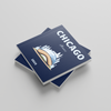 Two blue photobooks titled 'Chicago' on a light gray background