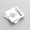 Two photobooks titled 'China' stacked on a gray background