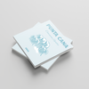 Two square photobooks titled 'Punta Cana' on a light gray background