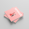 Two pink square photobooks titled 'Sevilla' on a gray background