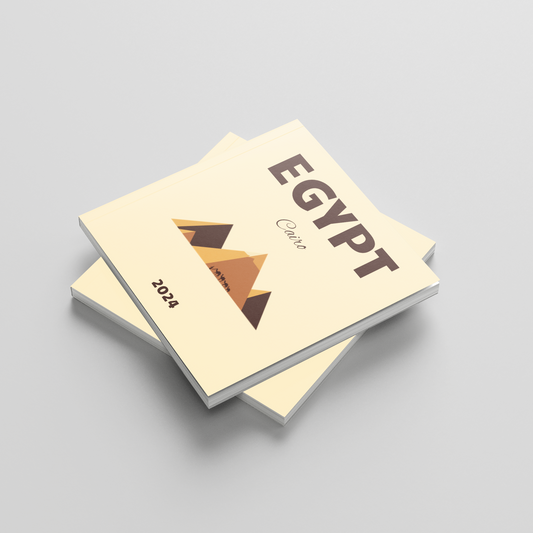 Two travel photobooks titled 'Egypt' on a light gray background