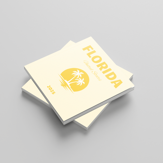 Stack of square photobooks with 'Florida' design on a gray background