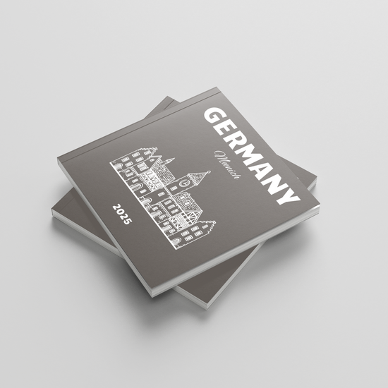 Stack of photobooks titled 'Germany' on a light gray background