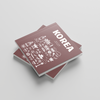 Stack of photobooks titled 'Korea' on a light gray background