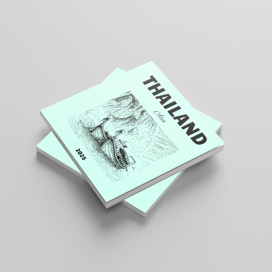 Stack of books with 'Thailand' and a map on the cover against a light gray background