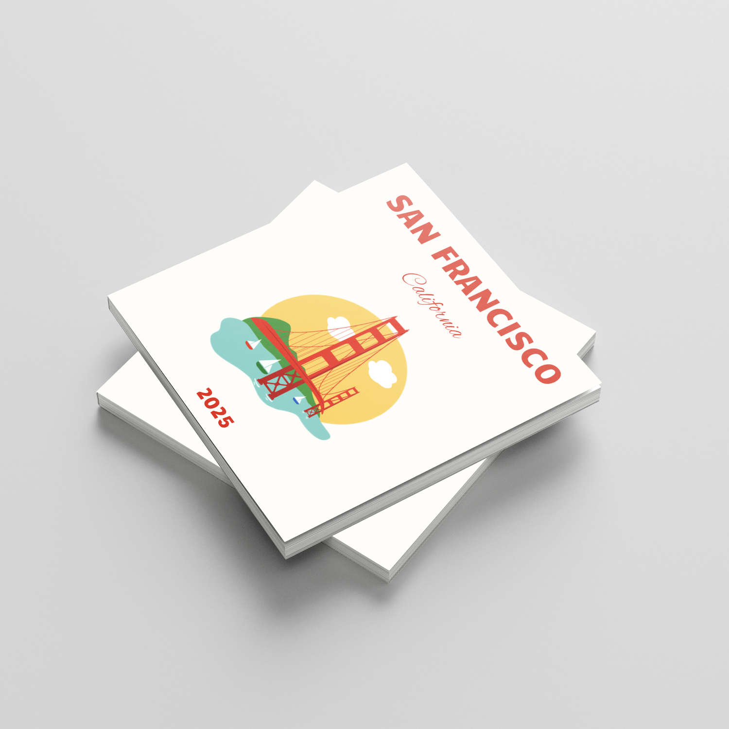 Stack of white square photobooks with colorful San Francisco design on a gray background